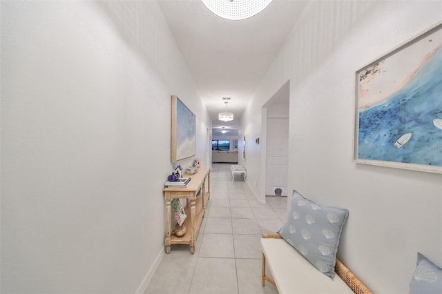 corridor featuring light tile patterned flooring