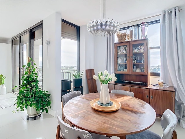 dining area featuring a chandelier