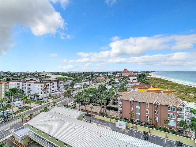 birds eye view of property featuring a view of the beach and a water view