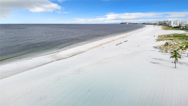 view of street with a water view and a view of the beach