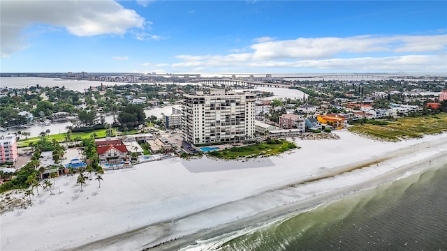 bird's eye view featuring a beach view and a water view