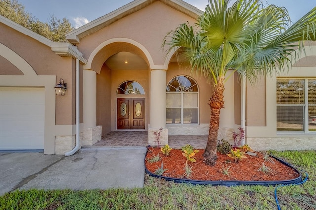 property entrance with a garage