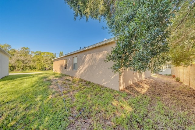 exterior space featuring a lawn