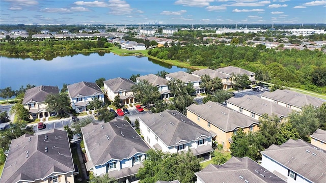 drone / aerial view with a water view