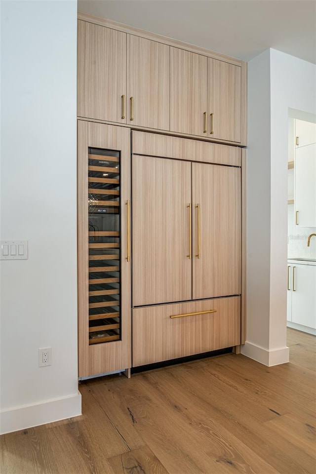 closet with beverage cooler and sink