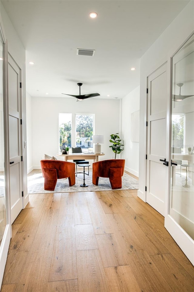 hallway featuring light hardwood / wood-style flooring