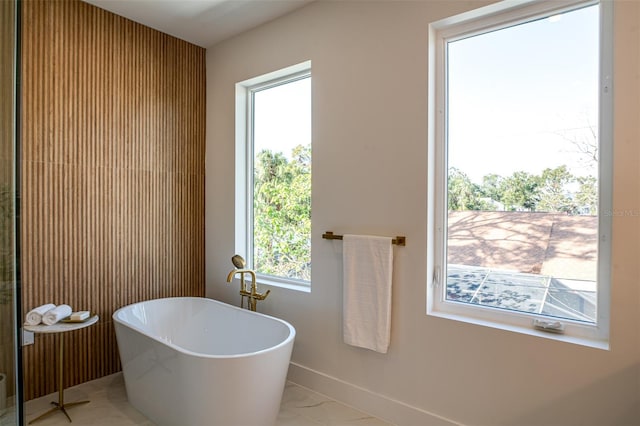 bathroom with a tub