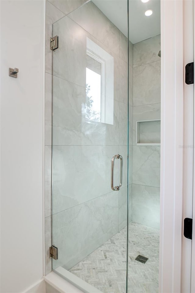 bathroom featuring walk in shower