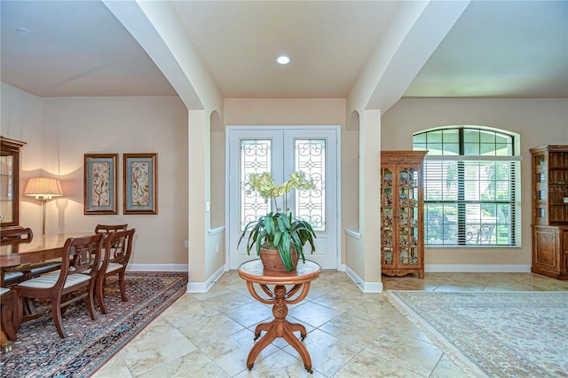 entrance foyer with a wealth of natural light and french doors