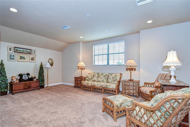 carpeted living room featuring lofted ceiling