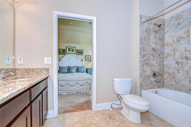 full bathroom featuring vanity, toilet, and tiled shower / bath