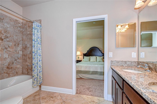 full bathroom with vanity, shower / bath combo with shower curtain, toilet, and tile patterned floors