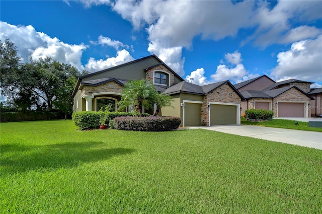 view of front of home featuring a garage and a front lawn