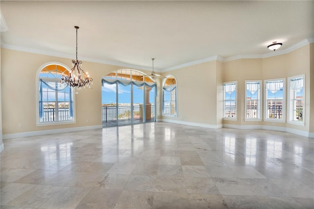 empty room featuring a chandelier and ornamental molding