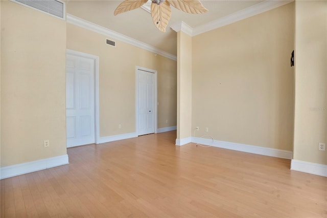 unfurnished room with ceiling fan, light hardwood / wood-style flooring, and crown molding