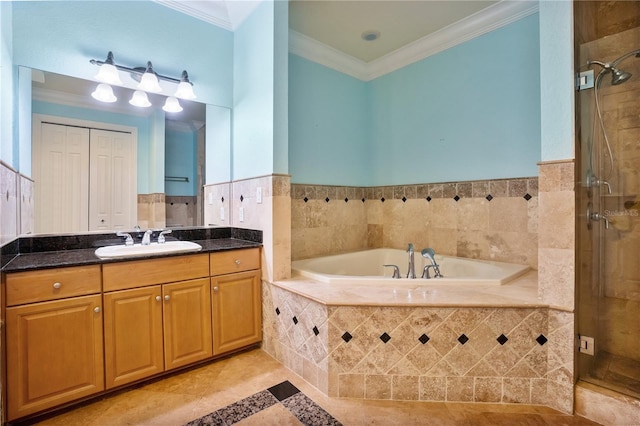 bathroom with plus walk in shower, ornamental molding, tile walls, and vanity