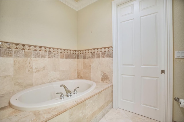 bathroom featuring tiled bath, ornamental molding, and tile patterned flooring