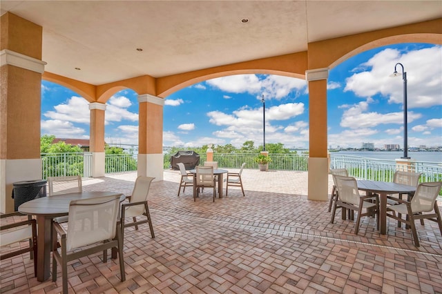 view of patio / terrace featuring a water view