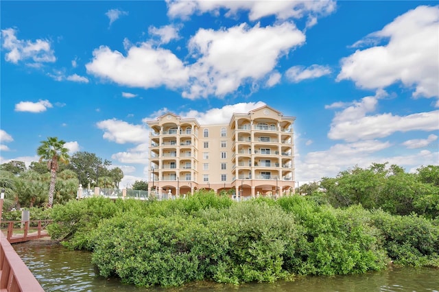 view of building exterior featuring a water view