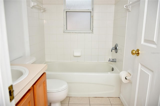 full bathroom featuring vanity, toilet, tile patterned flooring, and tiled shower / bath