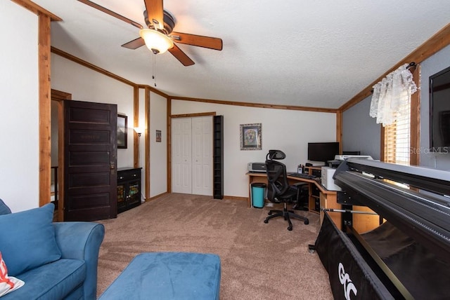 office featuring ornamental molding, a textured ceiling, ceiling fan, carpet floors, and lofted ceiling