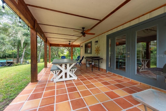 view of patio with ceiling fan and french doors