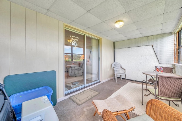 sunroom with a paneled ceiling