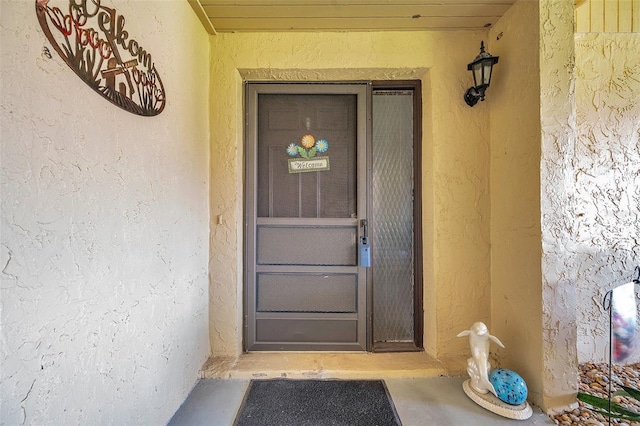 1308 13th Cir SE, Largo, FL 33771 - property entrance featuring stucco siding