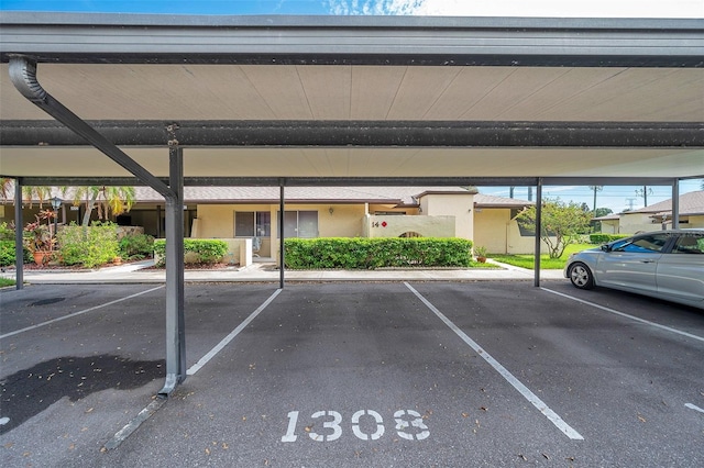 view of car parking featuring a carport