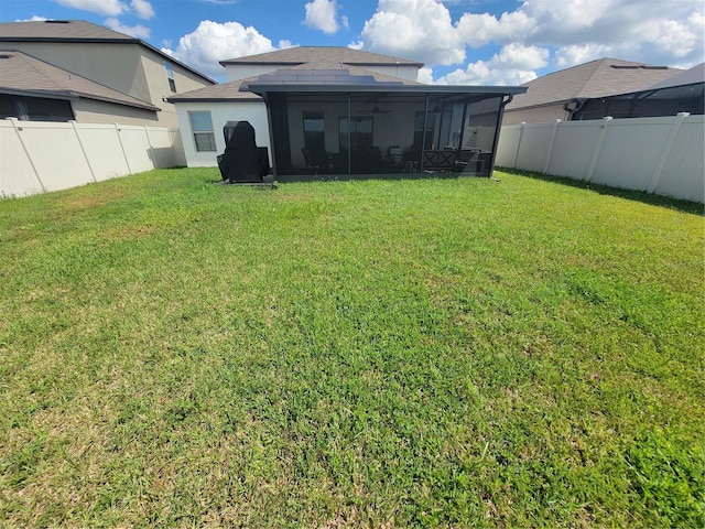 view of yard featuring a sunroom