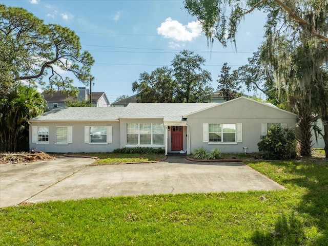 ranch-style home with a front yard