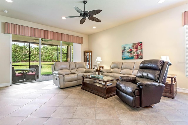 living room with light tile patterned floors and ceiling fan