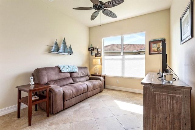 living room featuring light tile patterned flooring and ceiling fan