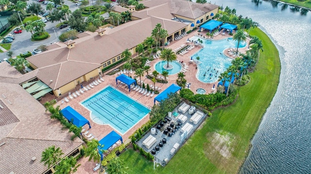 birds eye view of property featuring a water view