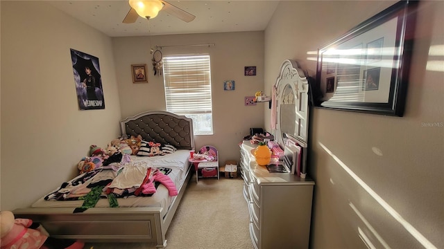 bedroom with light colored carpet and ceiling fan