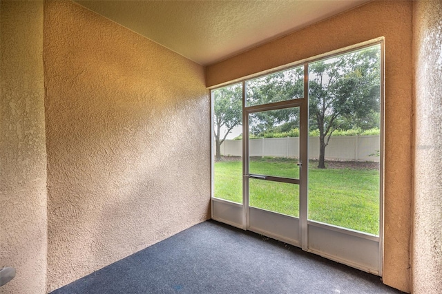 unfurnished sunroom with a healthy amount of sunlight