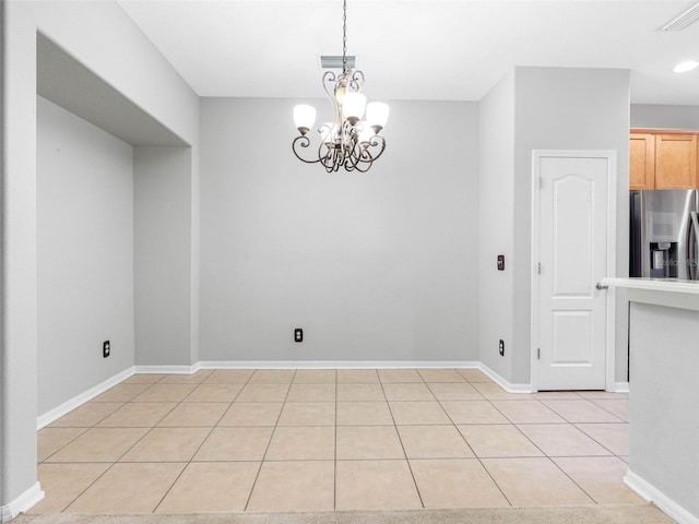 12820 Belvedere Song Way, Riverview, FL 33578 - unfurnished dining area with a chandelier and light tile patterned flooring