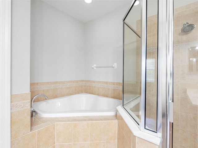 12820 Belvedere Song Way, Riverview, FL 33578 - bathroom featuring a garden tub, a stall shower, and recessed lighting