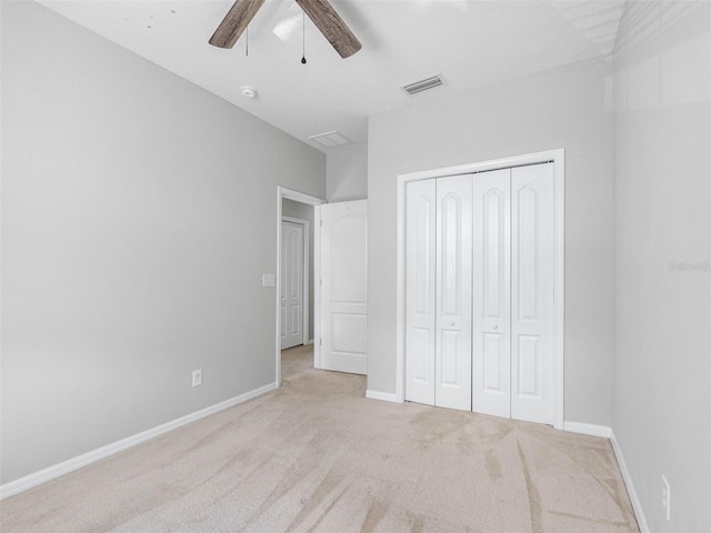 12820 Belvedere Song Way, Riverview, FL 33578 - unfurnished bedroom featuring carpet floors, a closet, and ceiling fan