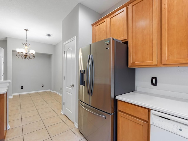 12820 Belvedere Song Way, Riverview, FL 33578 - kitchen with stainless steel refrigerator with ice dispenser, dishwasher, a chandelier, light tile patterned flooring, and light countertops