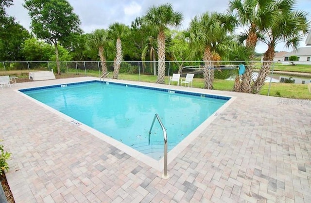 view of pool featuring a patio