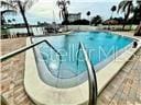 view of swimming pool with a water slide