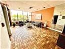 living room featuring parquet floors