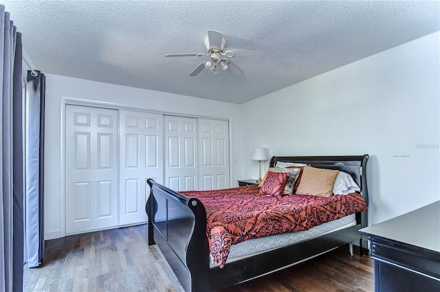 bedroom featuring ceiling fan, a textured ceiling, a closet, and hardwood / wood-style floors