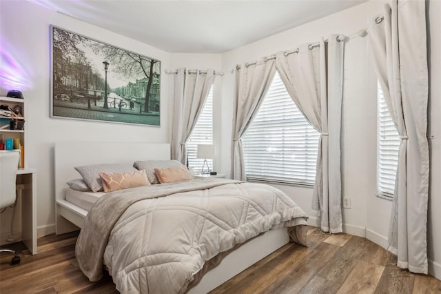 bedroom featuring hardwood / wood-style flooring