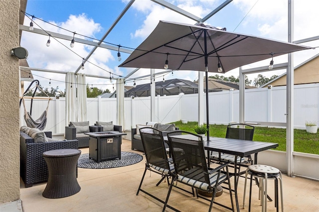 view of patio with a fire pit