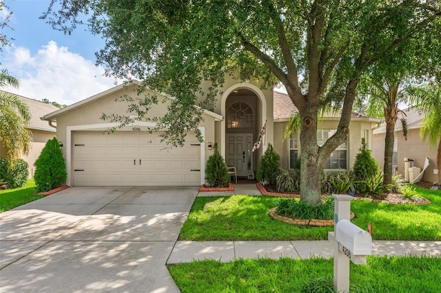 view of front of home with a garage