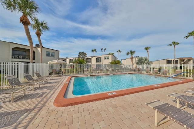 view of pool featuring a patio area