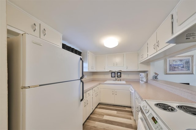 kitchen featuring light hardwood / wood-style floors, white appliances, white cabinetry, and sink