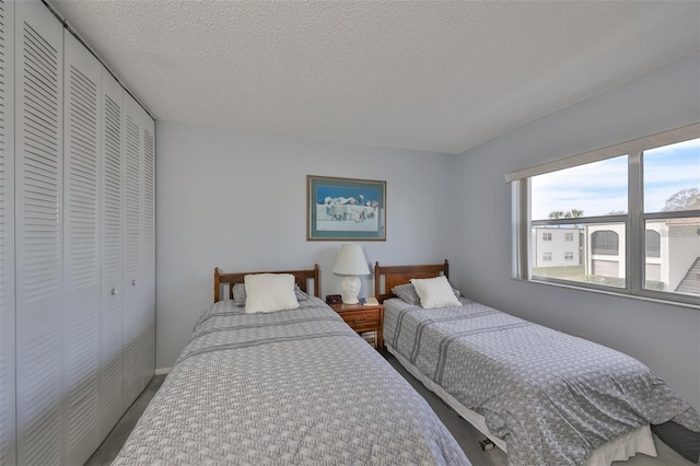 bedroom featuring a closet and a textured ceiling